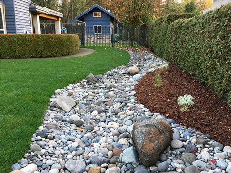 Dry riverbed with a variety of river rock and pebbles