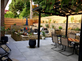 Back yard with multi level patios and stepped retaining walls