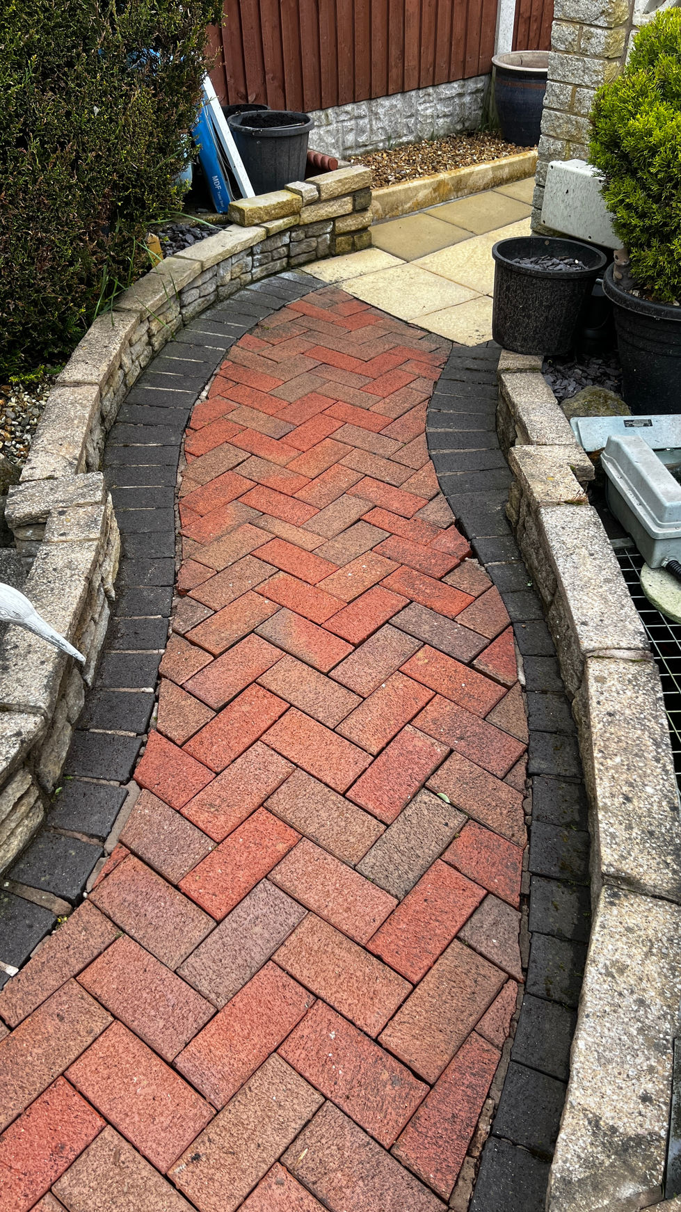 Cleaned garden pathway after professional pressure washing