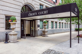 Building front of Liberty Court, 200 Rector Pl, NY, NY 10280 in summer photographed by Kristina Ott, NYC real estate photographer.