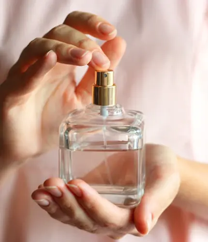 girl-uses-perfume-perfume-female-hands_441923-1445.webp