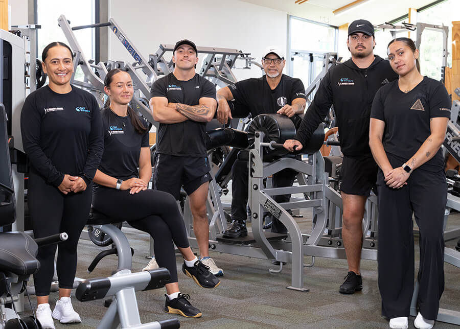 The Ngā Purapura fitness team posing in the gym.