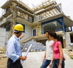 Construction manager shows new home plans to clients