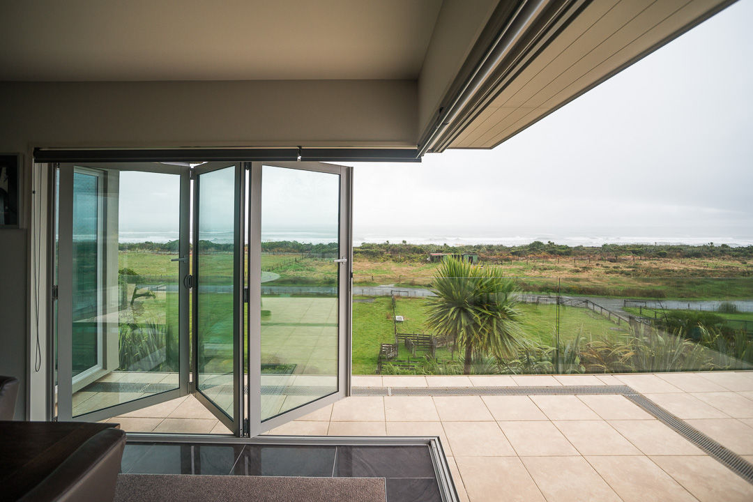 Aluminium sliding doors with garden views, Nulook installation by Sotherans Greymouth.