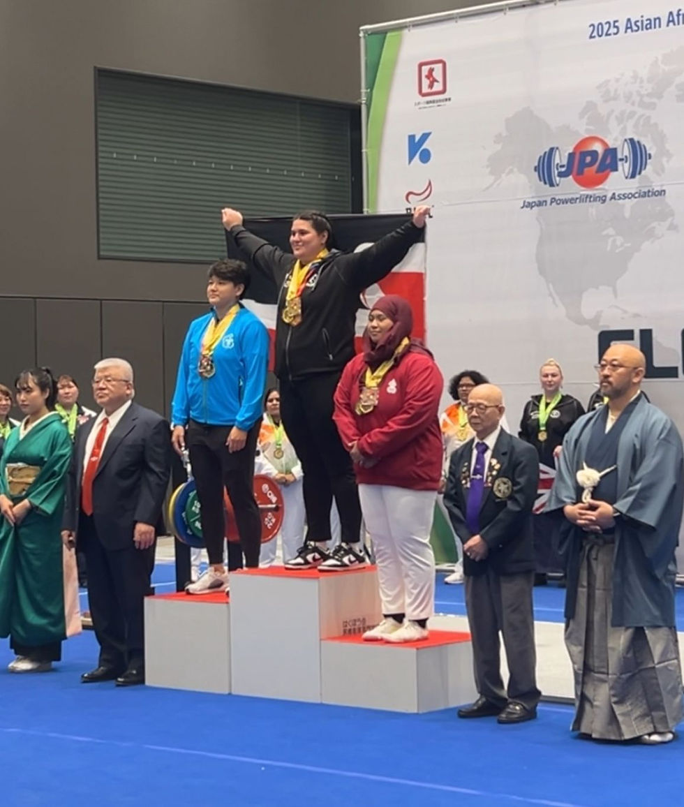Riria Ropata on the podium with the Tino Rangatira flag