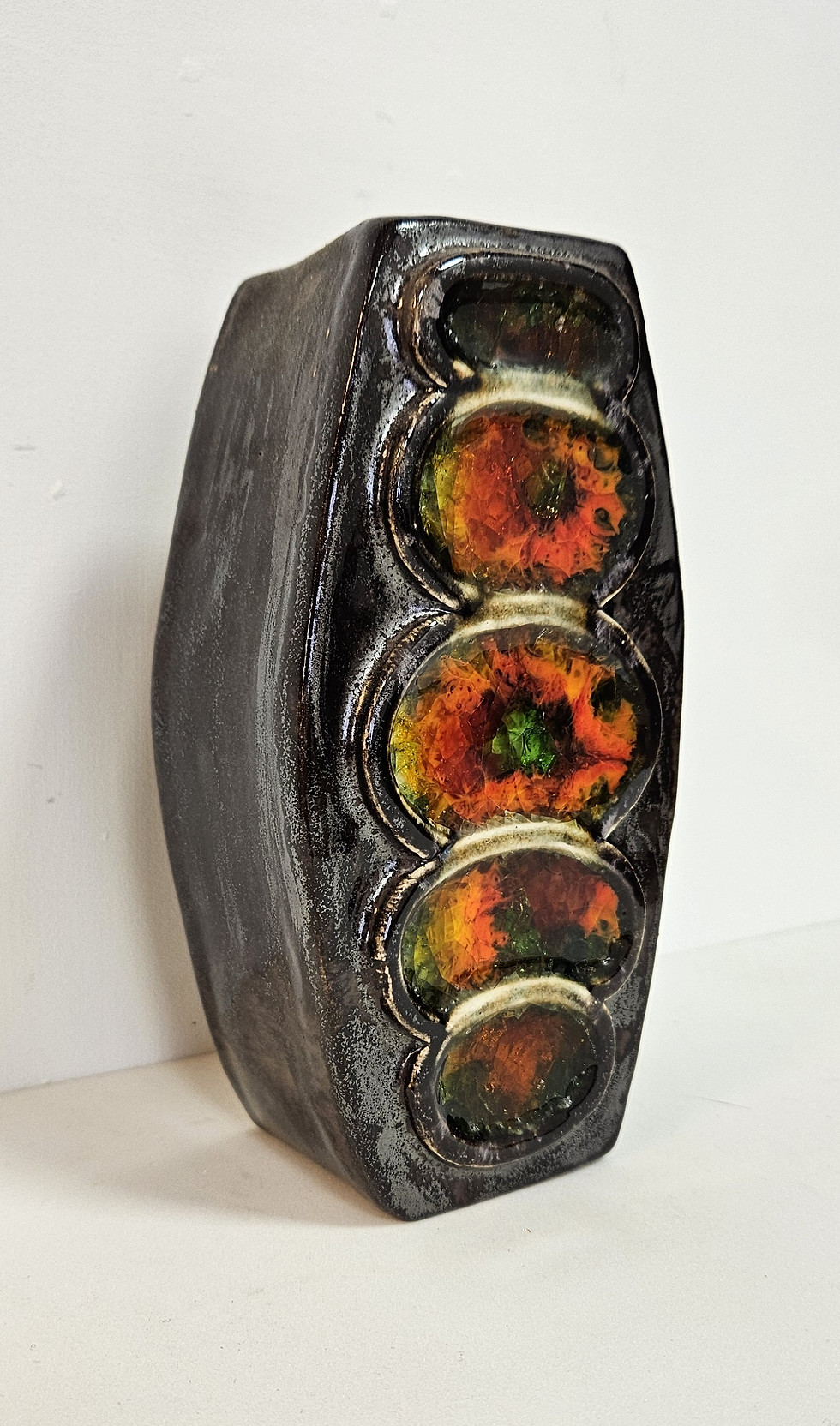 Thumbnail: Tomoku glazed stoneware vase with inlaid red, orange, and blue glass