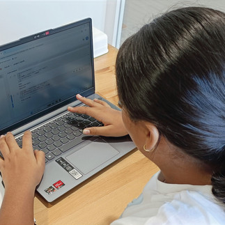 Student learns the basic concepts of Python in our Intro to Python 1 Class