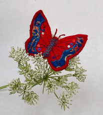 Red and blue brooch