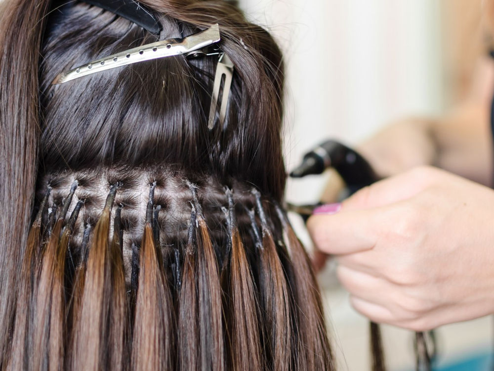 How to Remove Your Hair Extensions At Home, According to Stylists