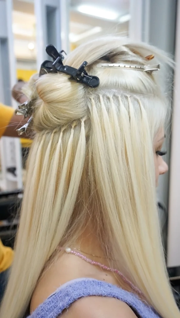 Blonde hair extensions Bali at The Shampoo Lounge premium salon offering tape in and nano ring extensions in Seminyak Sanur and Ubud