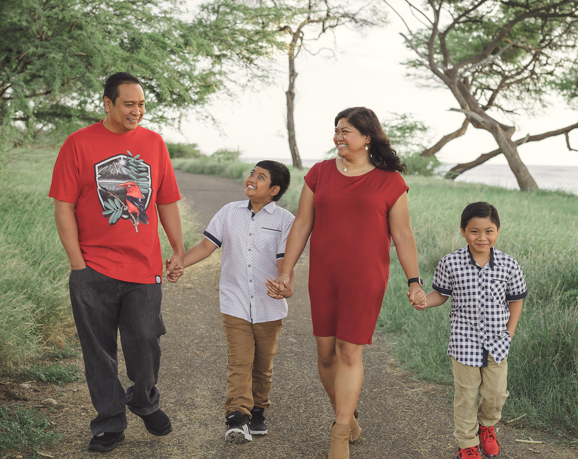 Family members holding hands while walking