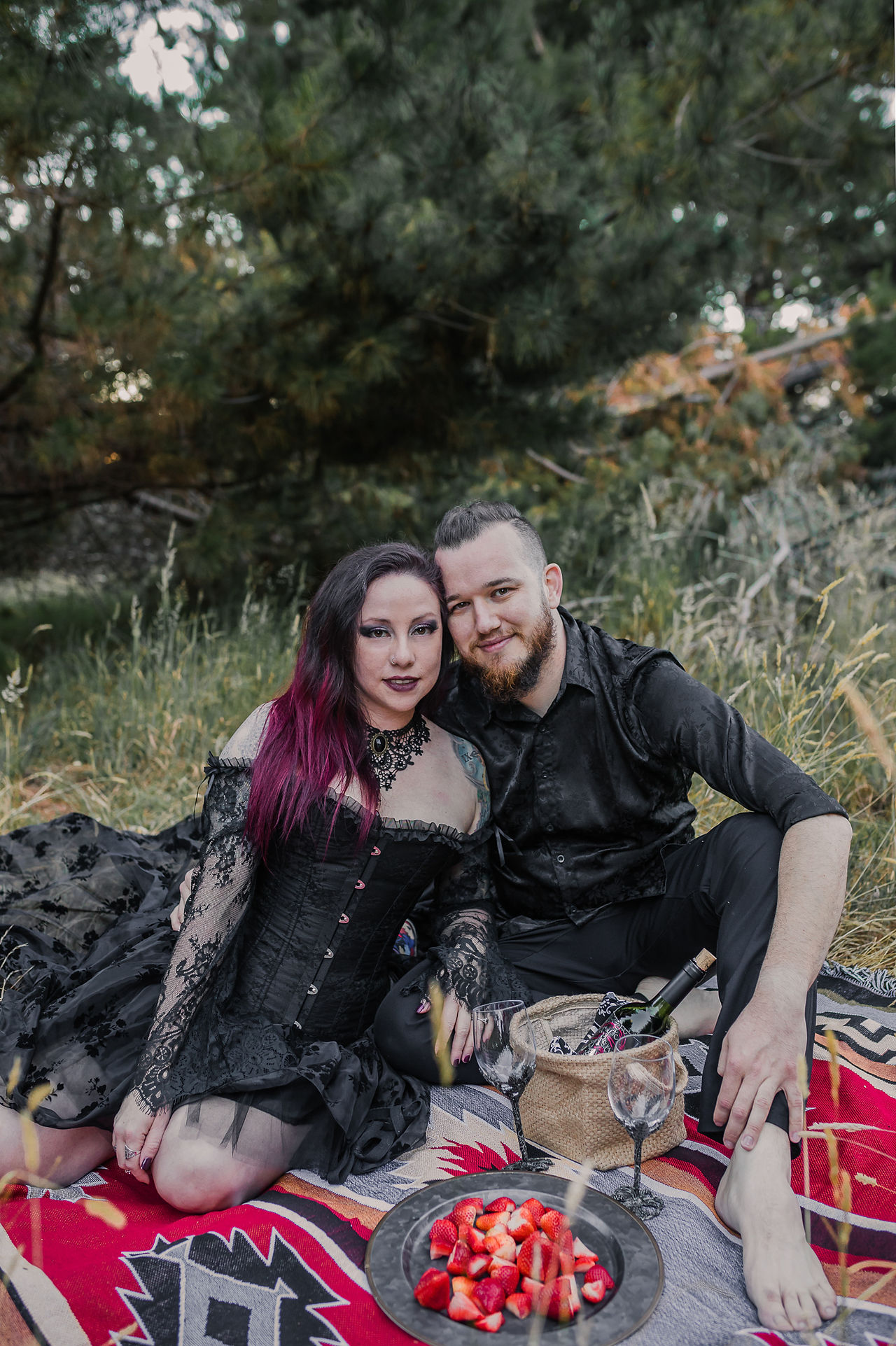 couple sitting and posing at their picnic