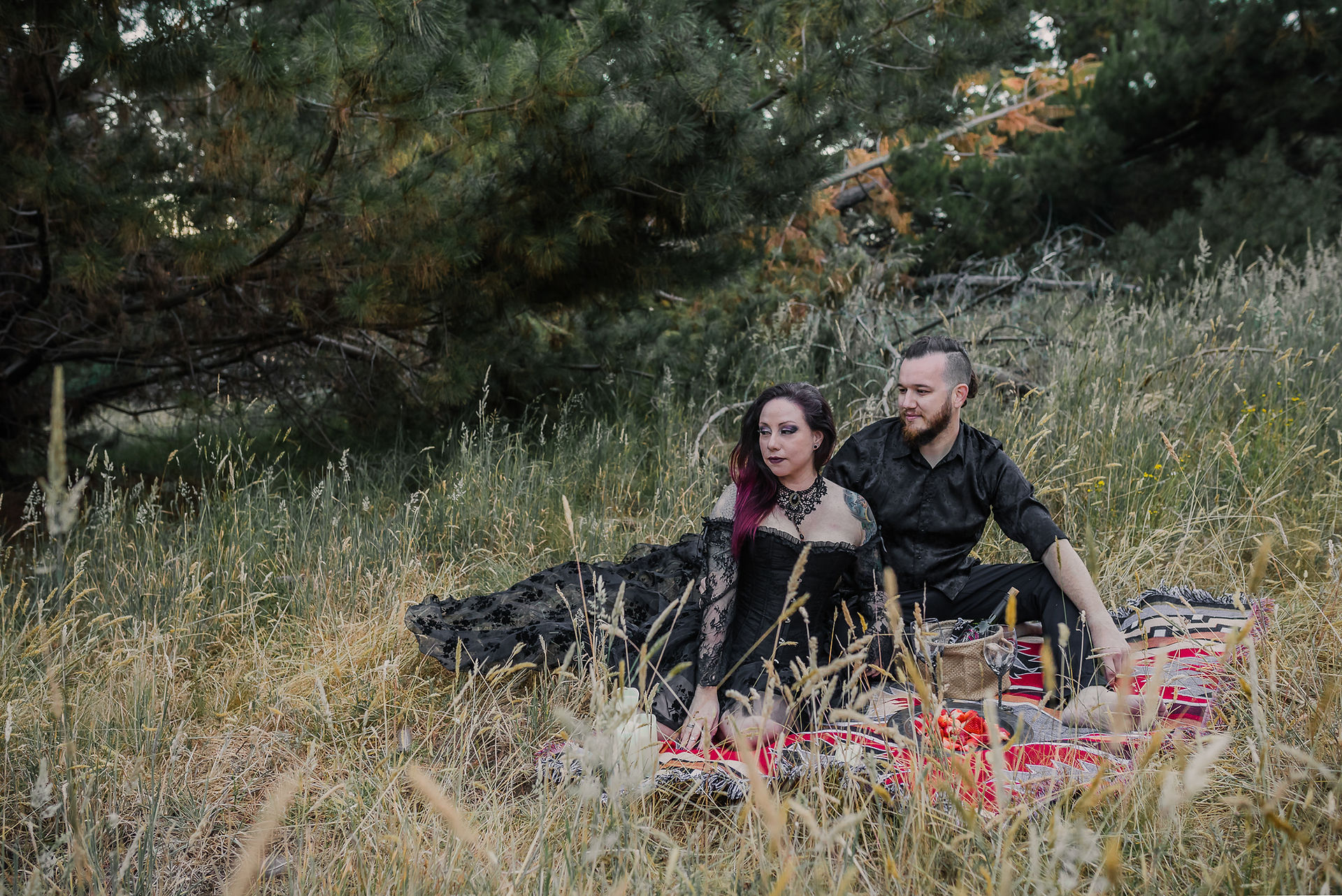 couple having a picnic in the woods