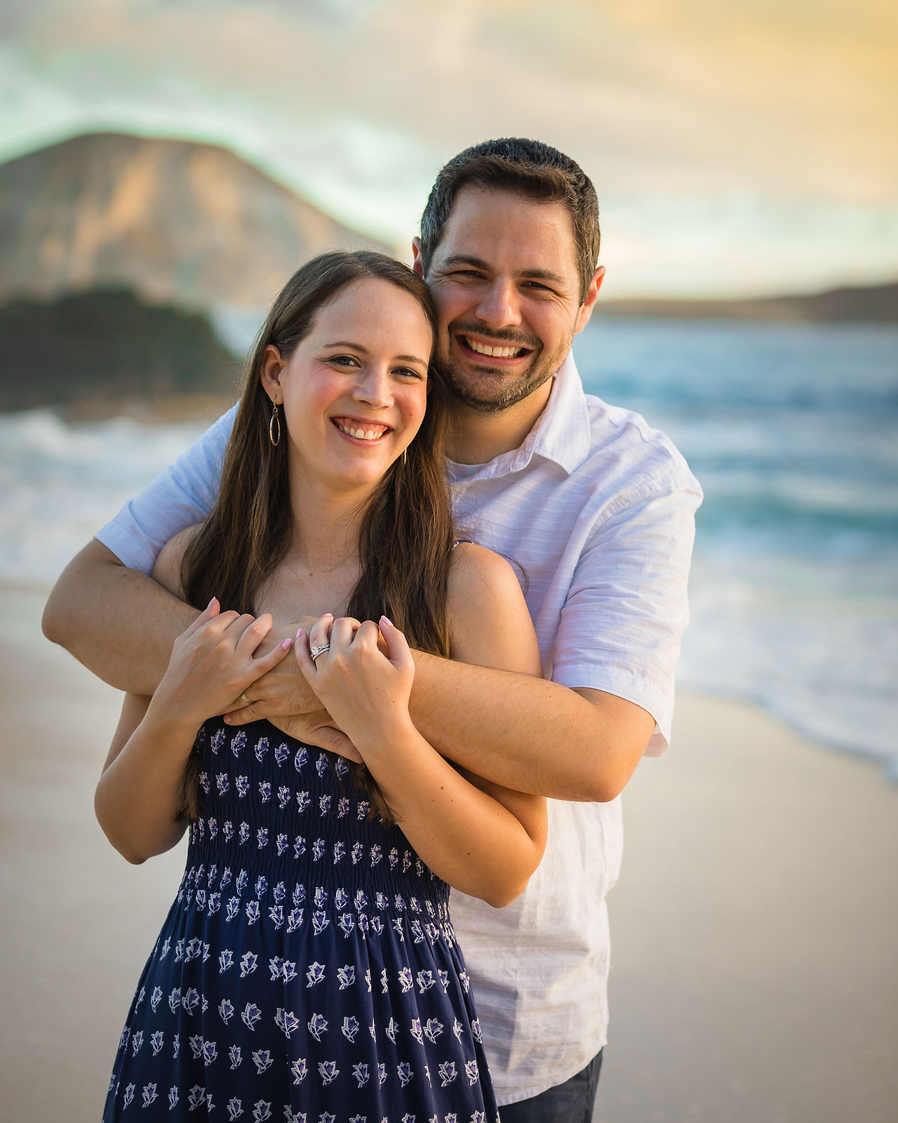 couple hugging on the beach