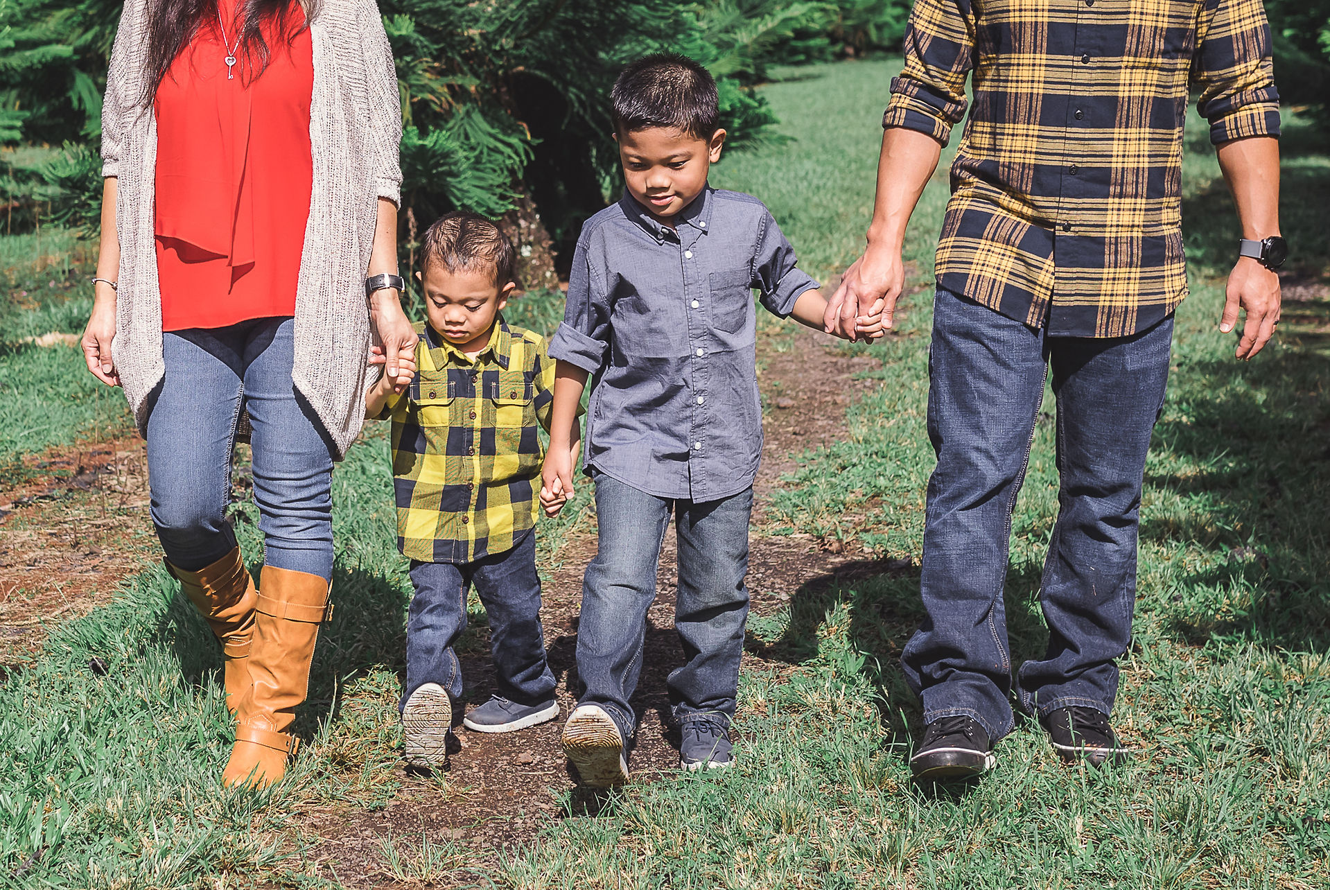 Family holding hands walking together