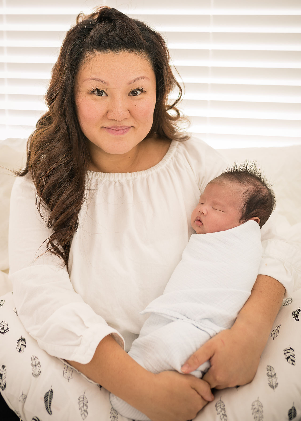 Mom and newborn son portrait