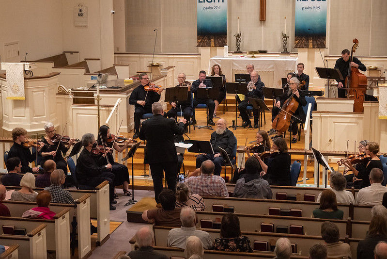 Maestro Simeone directing the orchestra