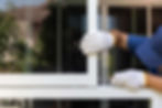 A window replacement specialist works on a new window installation.
