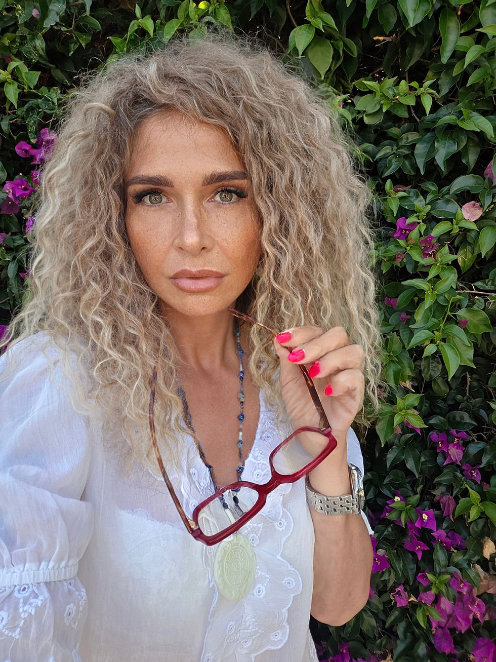 KL Model with red glasses in her hand