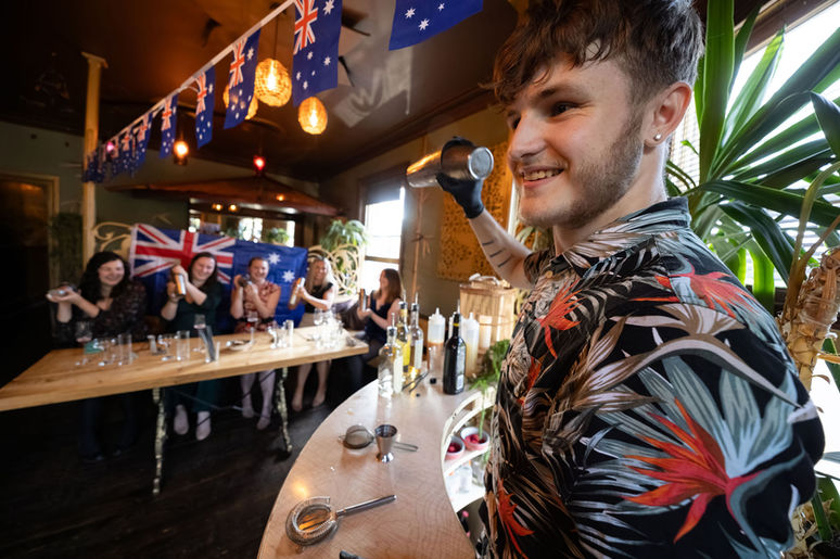Bartender demonstrating cocktail techniques during a cocktail class at Mango Thai, Southampton.