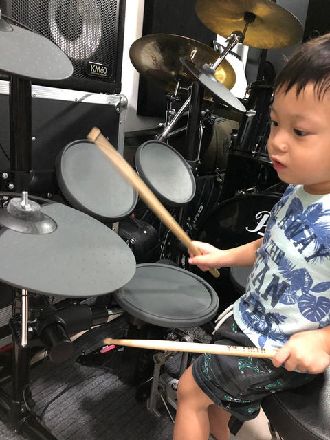 Drum lessons for kid at The Music Shed Singapore