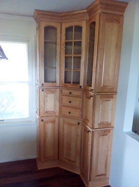 9 cabinet corner with layers upon layers of decorative trim