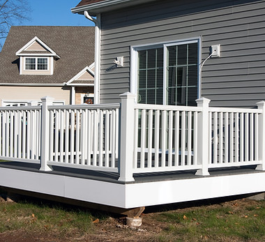 rear-view-of-a-modern-custom-built-house-newly-constructed-with-a-walk-out-porch-SBI-30104