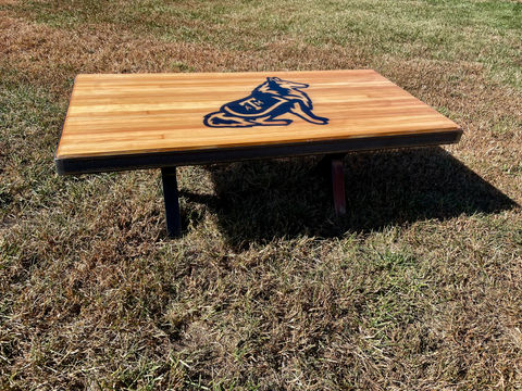 3/4 view of coffee table featuring Texas A&M dog logo