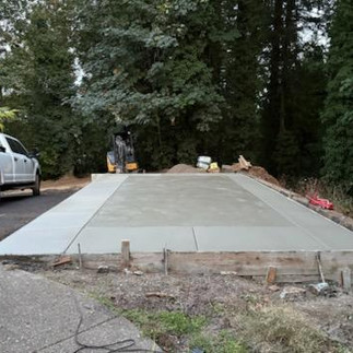 Vancouver concrete parking pad installed on slope