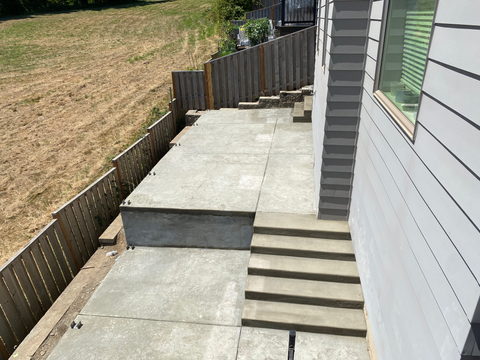 Modern concrete patio with stairs - installed by Keystone Vancouver concrete contractors