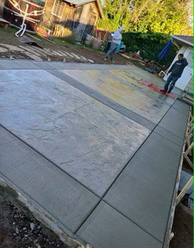 Stained decorative concrete backyard patio - installed near Vancouver Washington