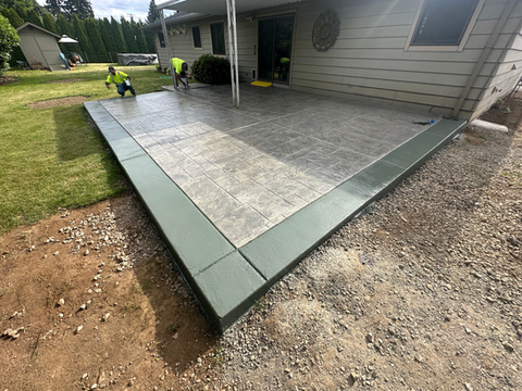 Stamped and stained decorative concrete patio installation