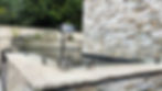 Glass-pond-jump-guards-with-stainless-steel-clamps-stone-cladded-pond.JPG
