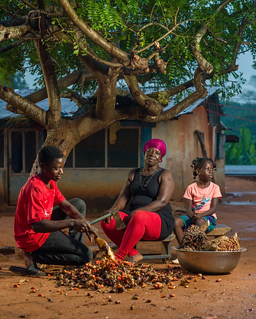 Magaret - a multicrop farmer in Eastern region processing oil palm. Photo credit FINCA