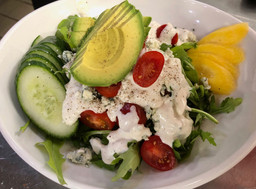 Arugula, cucumber, avocado, mago and tomato with house made blue cheese dressing. Optional bacon.
