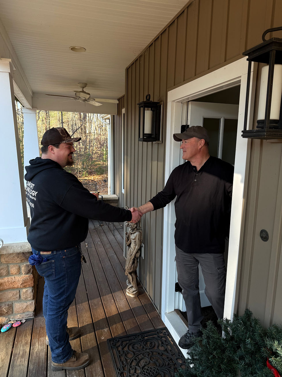 Comfort Technology heating and airconditioning HVAC Technician greeting homeowner in Yorktown, VA