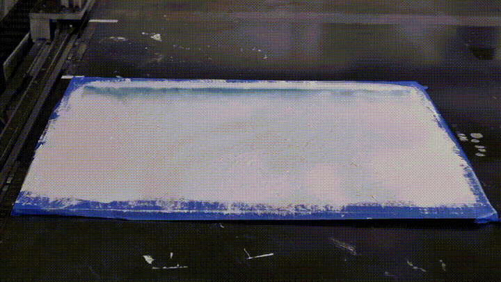 These tanks hold the paint supply and deliver it to the inkjet print heads below.