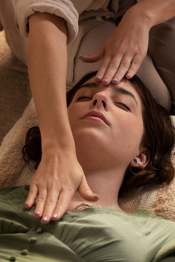 person-conducting-reiki-therapy.jpg