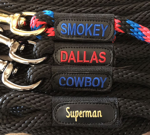 Block ALL CAPS and Billboard embroidery on horse lead ropes.
