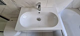 Image showing the results of cleaning a bathroom sink during an end of tenancy clean in a domestic property in Bushey.