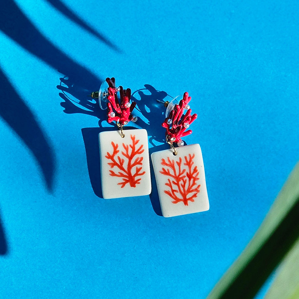 Thumbnail: Boucles d'oreilles corail rouge