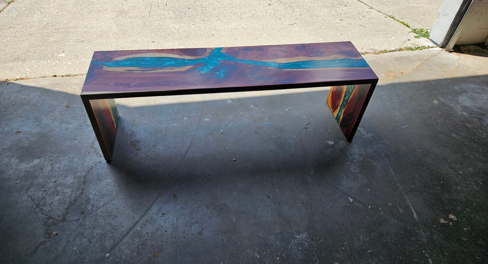 Live-edge Monkeypod epoxy river dining table built by Exotic Wood Depot in Orlando, Florida.