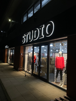 Studio Raised Brushed Silver Cut Out Letters Applied Onto Sign