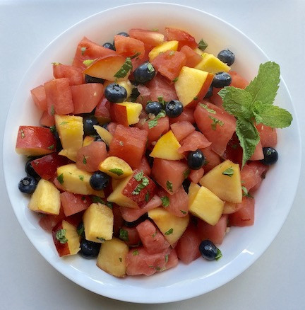 summer fruit salad with watermelon, nectarines, blueberries, mint and lime
