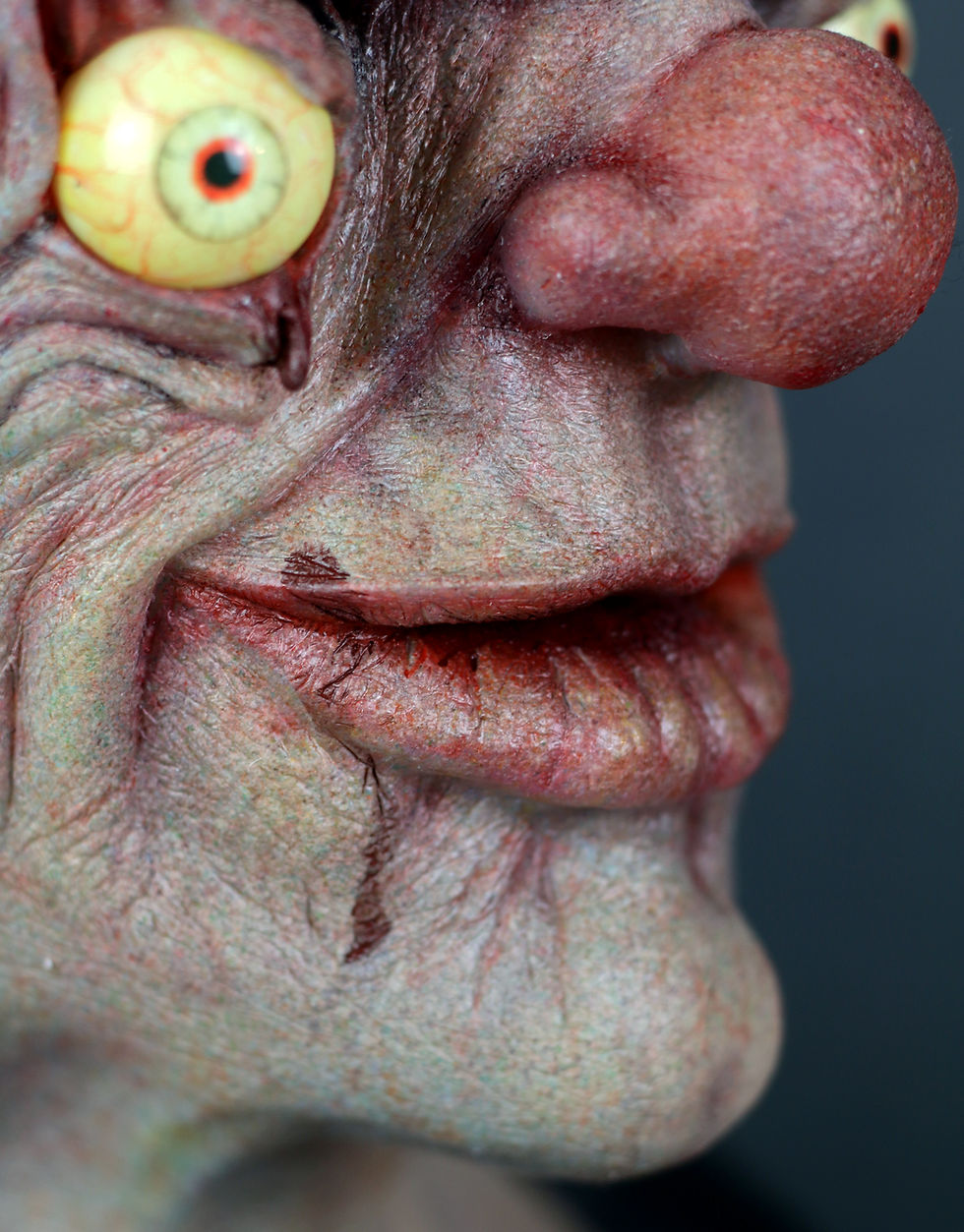 Thumbnail: Creepy clown silicone mask close up