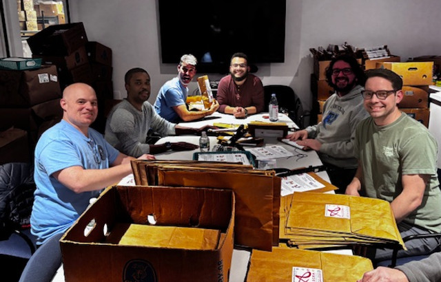 Group of men meeting for local family advocacy efforts.