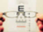 looking at an eye chart through a pair of glasses