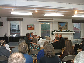 An amateur chamber music group performing at the final workshop of the session