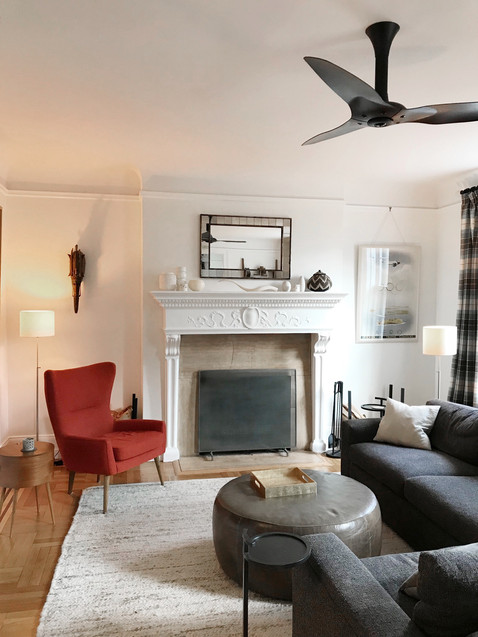 red chair fireplace sofa