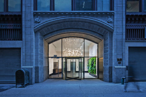 exterior historic building green wall revolving door